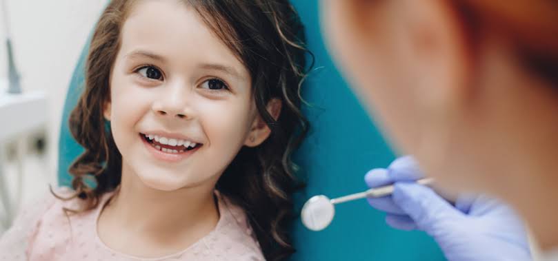 Child smiling at dentist Riverside Family Dentistry Austin TX